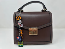 Load image into Gallery viewer, Papaya Down Under (Lando, Oscar) Bag Charm - EnchantedByGi
