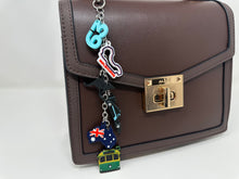Load image into Gallery viewer, Silver Arrow Down Under (George, Kimi) Bag Charm - EnchantedByGi
